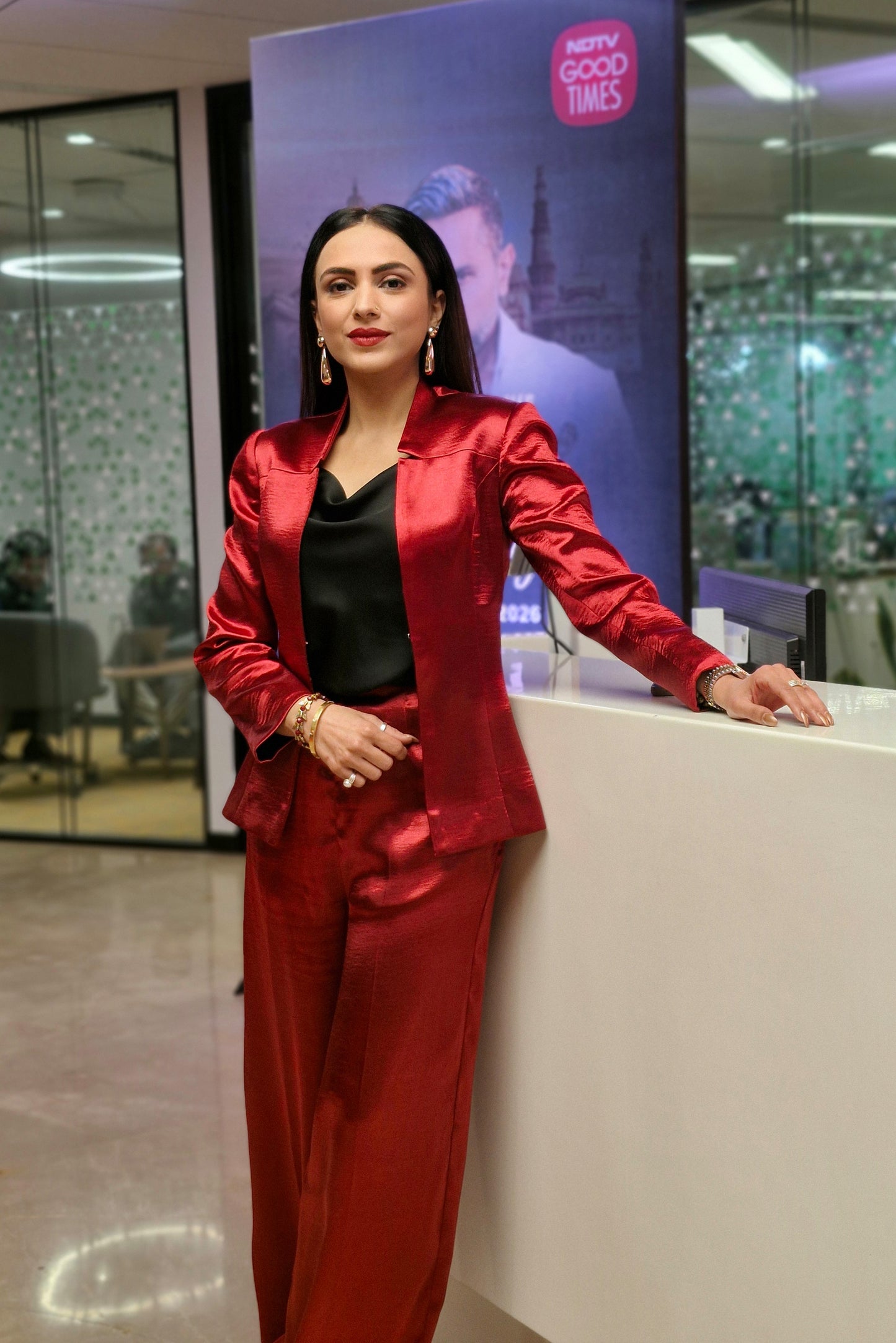 Malika Malhotra in Crimson Split Blazer and Flare Pants